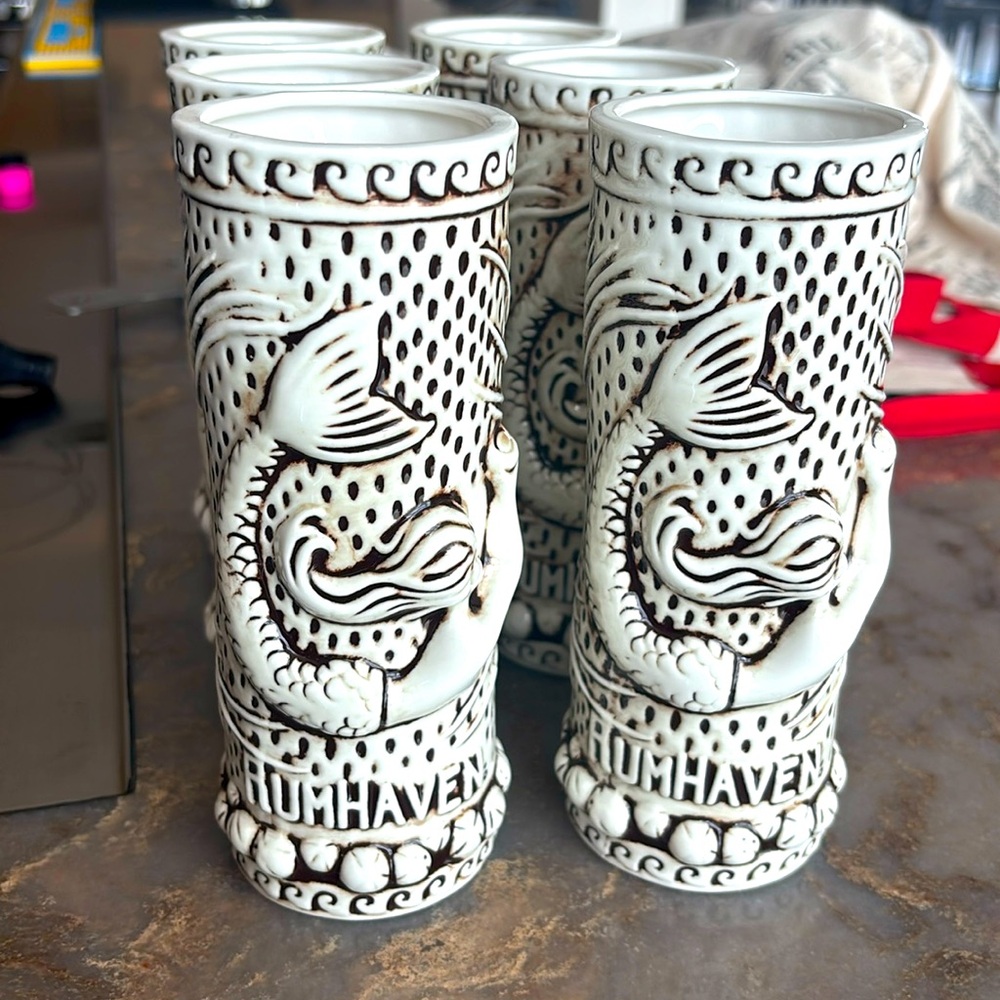 4 tiki/hurricane glasses from the Rum Haven brand. Perfect for entertaining